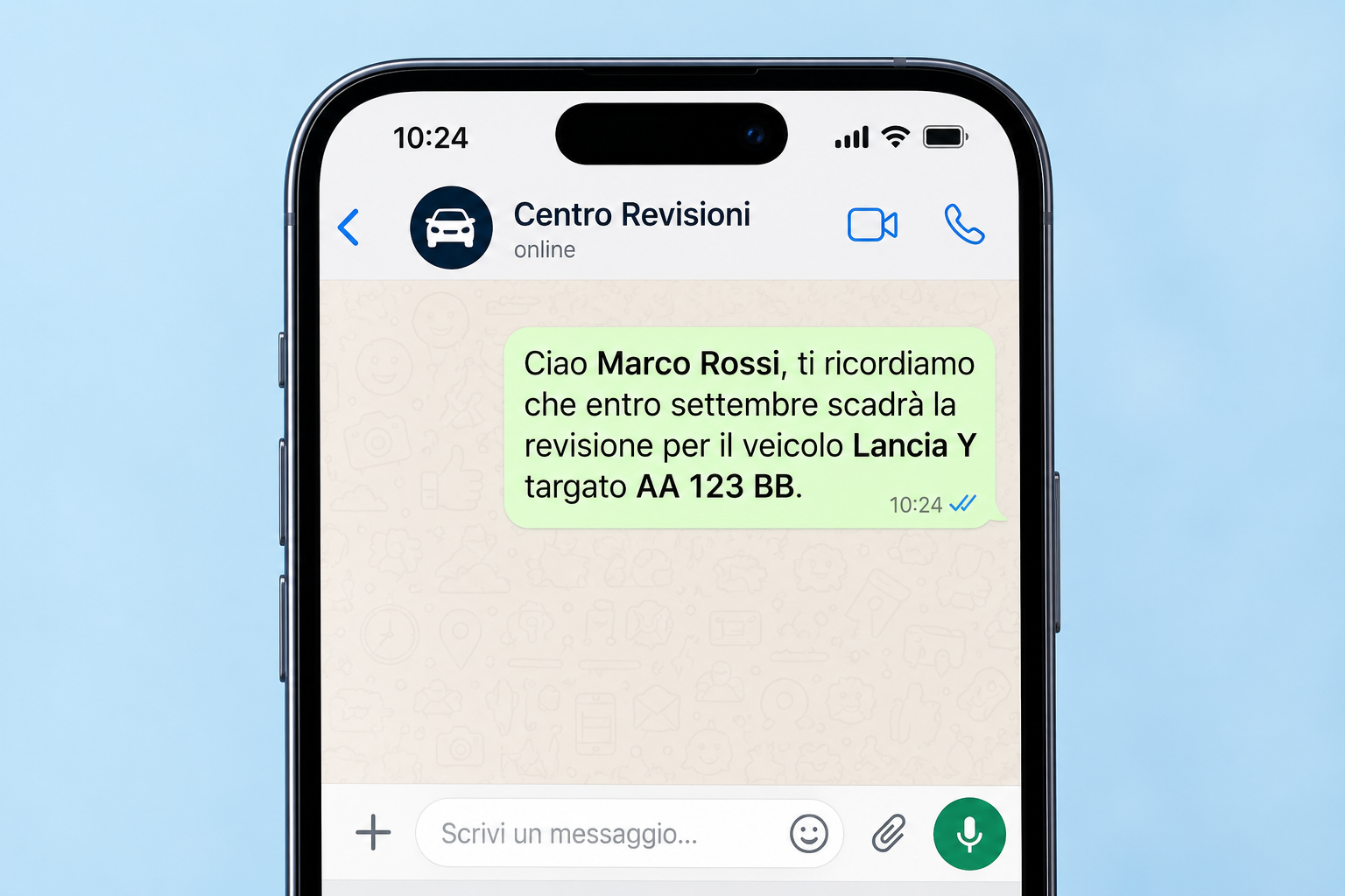 Smartphone con notifica WhatsApp del Centro Revisioni